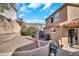 This Backyard features low-maintenance landscaping with desert plants and plenty of space at 450 W Mountain Sage Dr, Phoenix, AZ 85045