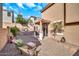 Backyard area with desert landscaping, and a covered patio; a perfect space for relaxation or entertainment at 450 W Mountain Sage Dr, Phoenix, AZ 85045