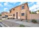 Inviting two-story home featuring a stucco exterior, tiled roof, and desert landscaping at 450 W Mountain Sage Dr, Phoenix, AZ 85045