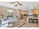 Open concept: a seamless transition from kitchen to living room at 450 W Mountain Sage Dr, Phoenix, AZ 85045