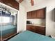 Bedroom featuring mirror closet doors, a ceiling fan, and built in cabinets at 591 S Ironstone Dr, Apache Junction, AZ 85119
