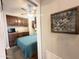 Inviting bedroom with a full wall of built-in cabinets and drawers and neutral colors at 591 S Ironstone Dr, Apache Junction, AZ 85119