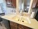 Bright kitchen sink with ample countertop, featuring a breakfast nook and cabinets at 591 S Ironstone Dr, Apache Junction, AZ 85119