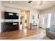 Living room area with wood floors and a view of the front door entryway at 591 S Ironstone Dr, Apache Junction, AZ 85119