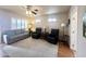 Bright living room with a large carpet, plenty of seating and a neutral color palette at 591 S Ironstone Dr, Apache Junction, AZ 85119