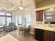 Well-lit living space with direct access to the kitchen, offering comfort and functionality at 591 S Ironstone Dr, Apache Junction, AZ 85119