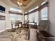 Inviting living room featuring neutral tones, large windows, and a cozy seating area, perfect for relaxation at 591 S Ironstone Dr, Apache Junction, AZ 85119