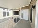 View of white metal porch railing with shade covering, and exterior light fixture at 591 S Ironstone Dr, Apache Junction, AZ 85119