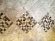 Close up view of the tile flooring featuring stone-look and mosaic tile patterns at 591 S Ironstone Dr, Apache Junction, AZ 85119
