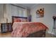 Comfortable bedroom with a plush bed, side table, and warm lighting, creating a cozy and inviting atmosphere at 6900 E Princess Dr # 1176, Phoenix, AZ 85054