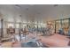 Fitness center with exercise equipment, weights, mirrors and a rubber floor at 6900 E Princess Dr # 1176, Phoenix, AZ 85054