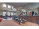 Fitness center with weights, treadmill, stairs, mirrors and windows at 6900 E Princess Dr # 1176, Phoenix, AZ 85054