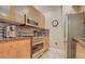 Modern kitchen equipped with stainless steel appliances, custom cabinetry, and granite countertops for a sleek and functional space at 6900 E Princess Dr # 1176, Phoenix, AZ 85054
