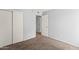 A simple bedroom features a closet, neutral paint, carpet and electrical outlets at 8125 N 32Nd Dr, Phoenix, AZ 85051