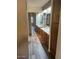 Bathroom featuring dual vanities, tile flooring, and mirrored closet doors at 818 S Westwood -- # 233, Mesa, AZ 85210