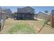 Spacious backyard with a patio, grill, and play equipment at 8742 W Edgemont Ave, Phoenix, AZ 85037