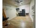 A small living area featuring a kitchenette and chair at 8742 W Edgemont Ave, Phoenix, AZ 85037