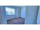Bright bedroom with natural light and beige carpet at 948 S Alma School Rd # 71, Mesa, AZ 85210