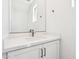 Modern bathroom vanity featuring white cabinets, a sleek countertop, and a contemporary sink at 10241 E Ursula Ave, Mesa, AZ 85212