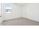 Bright bedroom features a large window and door at 10241 E Ursula Ave, Mesa, AZ 85212