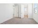 Carpeted bedroom features views to additional rooms at 10241 E Ursula Ave, Mesa, AZ 85212