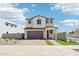 Charming two-story home boasting a neutral color scheme and a well-manicured yard at 10241 E Ursula Ave, Mesa, AZ 85212