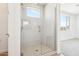 A modern glass shower with bright tile and a view of the sky at 10241 E Ursula Ave, Mesa, AZ 85212