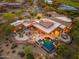 Aerial view showcasing the backyard swimming pool, outdoor seating areas, and landscaping at 10267 E Cinder Cone Trl, Scottsdale, AZ 85262