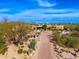 Stunning desert home with mature landscaping, paved driveway and picturesque mountain views at 10267 E Cinder Cone Trl, Scottsdale, AZ 85262