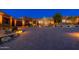 Well-maintained home with desert landscaping and a circular driveway at 10267 E Cinder Cone Trl, Scottsdale, AZ 85262