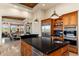 This spacious kitchen features a large island, stainless steel appliances, and connects seamlessly to the dining area at 10267 E Cinder Cone Trl, Scottsdale, AZ 85262