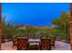 Relaxing outdoor patio offering comfortable seating, scenic views, and a peaceful desert setting at 10267 E Cinder Cone Trl, Scottsdale, AZ 85262