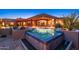Stunning pool reflecting house, offering an idyllic setting for outdoor relaxation and entertainment at 10267 E Cinder Cone Trl, Scottsdale, AZ 85262