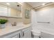 Bright bathroom featuring a shower and bath, sink, and mirrored medicine cabinet at 10330 W Thunderbird Blvd # A301, Sun City, AZ 85351