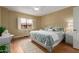 Cozy bedroom featuring natural light from the window and carpeted floors at 10330 W Thunderbird Blvd # A301, Sun City, AZ 85351