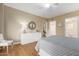 Bedroom featuring neutral walls and an ensuite bathroom and walk-in closet at 10330 W Thunderbird Blvd # A301, Sun City, AZ 85351
