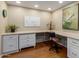 Home office space featuring hardwood floors, a desk area and natural light at 10330 W Thunderbird Blvd # A301, Sun City, AZ 85351