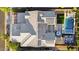 Birds eye view of a home with solar panels, swimming pool, and outdoor living at 10353 E Trillium Ave, Mesa, AZ 85212