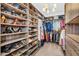 Spacious walk-in closet offering ample storage for clothing, shoes, and accessories at 10353 E Trillium Ave, Mesa, AZ 85212