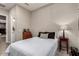 Bedroom featuring wood floors and a small writing desk, perfect for a room at 11385 N Luckenbach St, Surprise, AZ 85388