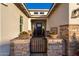 A welcoming entrance with decorative planters leading to the front door at 11385 N Luckenbach St, Surprise, AZ 85388