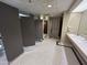 Clean and modern bathroom with updated fixtures and ample space at 114 W Adams St # 302, Phoenix, AZ 85003