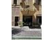 Orpheum Lofts entrance boasts a covered entrance, detailed architecture, and nearby shops in a vibrant city setting at 114 W Adams St # 302, Phoenix, AZ 85003
