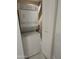 A well-lit laundry room featuring a stacked washer and dryer at 114 W Adams St # 302, Phoenix, AZ 85003