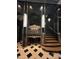 A building directory and stairs leading to the loft are visible in the building's lobby at 114 W Adams St # 302, Phoenix, AZ 85003