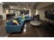 Inviting lounge area features a large sectional couch and entertainment area at 114 W Adams St # 302, Phoenix, AZ 85003