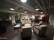 Multi-purpose community room with kitchen, lounge area, and game tables for residents at 114 W Adams St # 302, Phoenix, AZ 85003