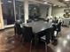 Community room with large table, chairs, billiards table, and comfortable seating at 114 W Adams St # 302, Phoenix, AZ 85003
