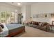 Bedroom with lots of light, ceiling fan, and backyard access at 11490 E Beck Ln, Scottsdale, AZ 85255