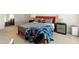 Comfortable bedroom with a decorative blanket, and bedside tables with lamps at 11490 E Beck Ln, Scottsdale, AZ 85255